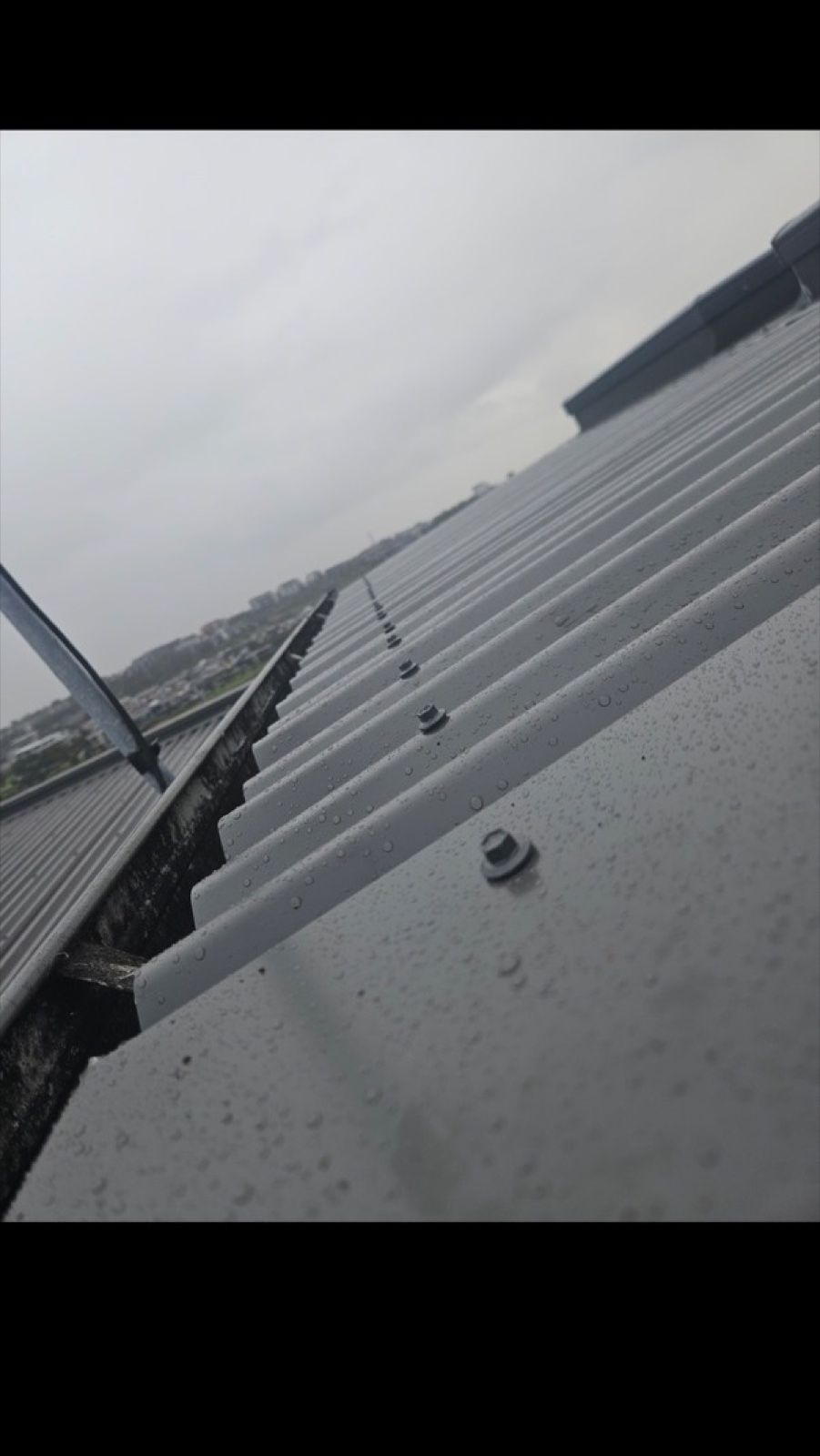 View along a Heasly & Son metal roof — Melbourne
