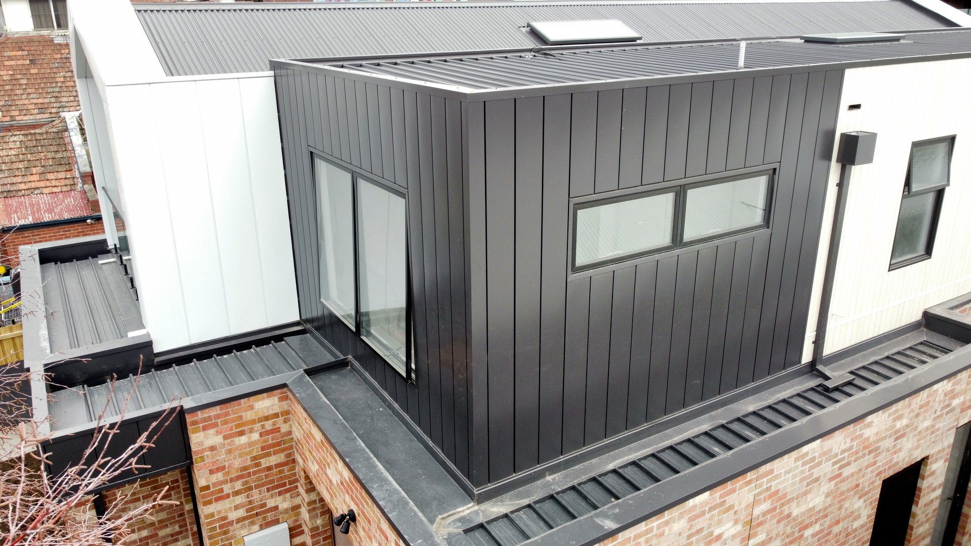 Interlocking panel cladding — Heasly & Son architectural cladding Melbourne