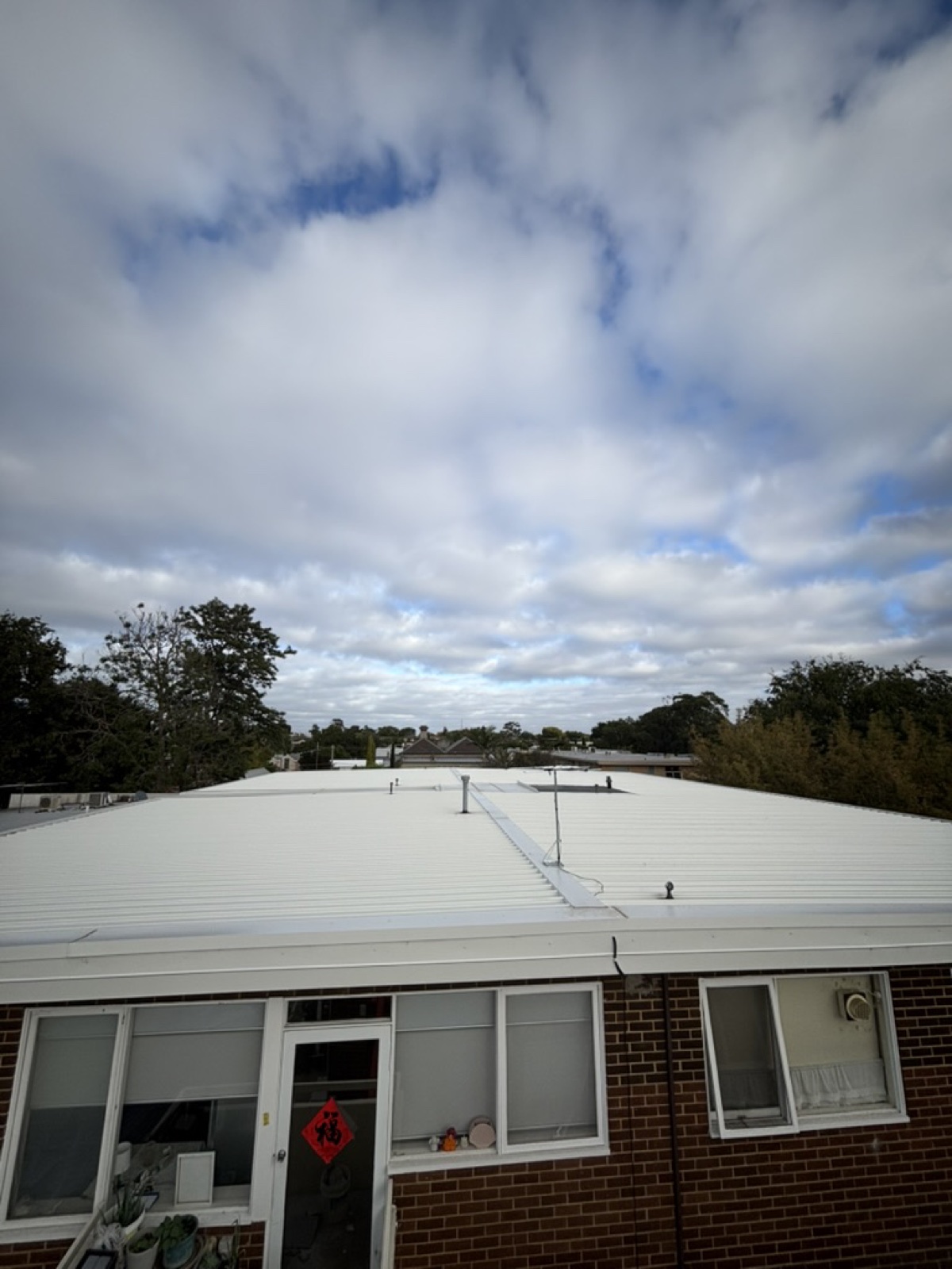 Armadale — two 1970s flat blocks — Heasly & Son roof replacement Armadale Melbourne