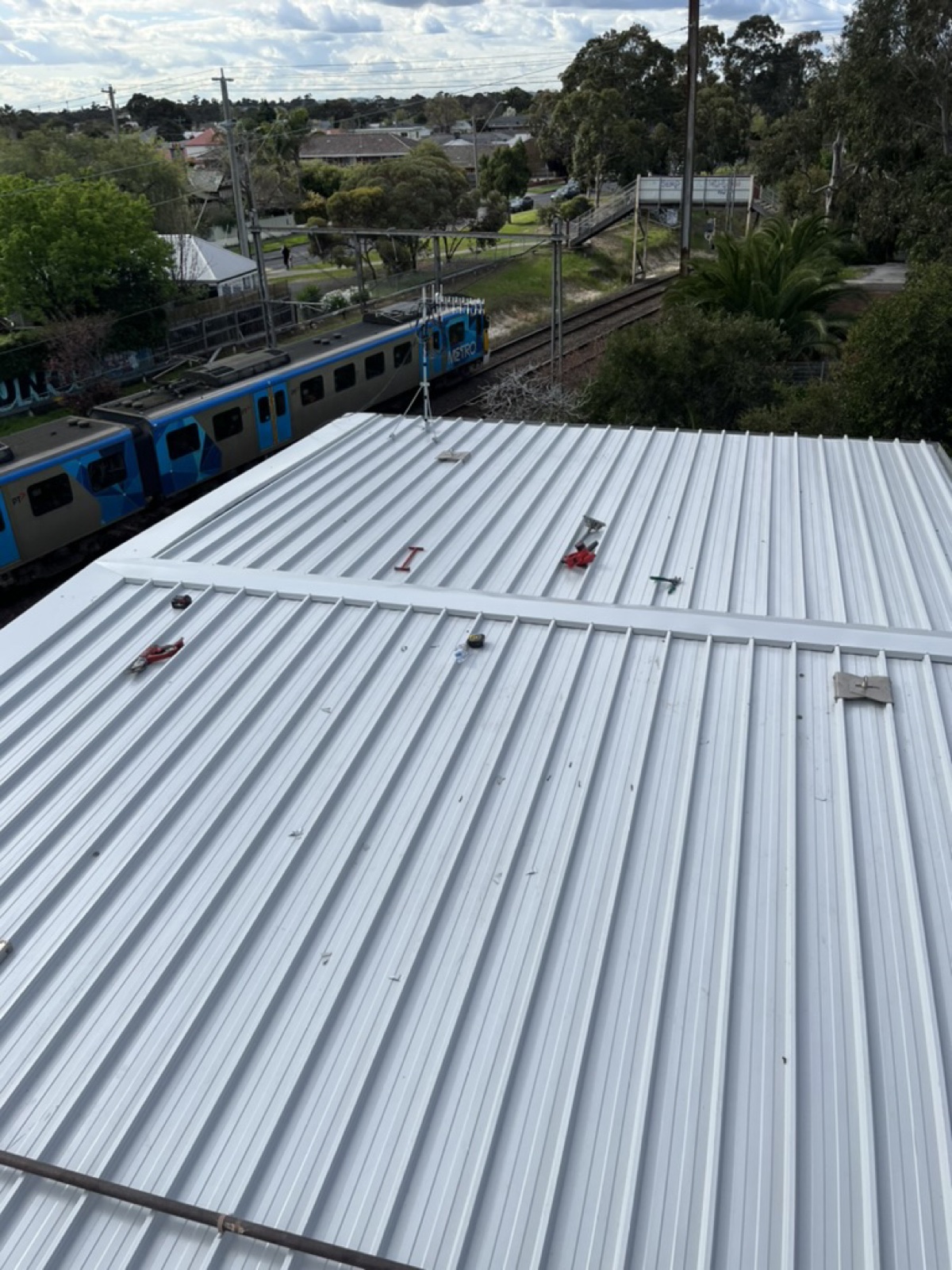 Essendon commercial re-roof — Heasly & Son commercial roofing Essendon Melbourne