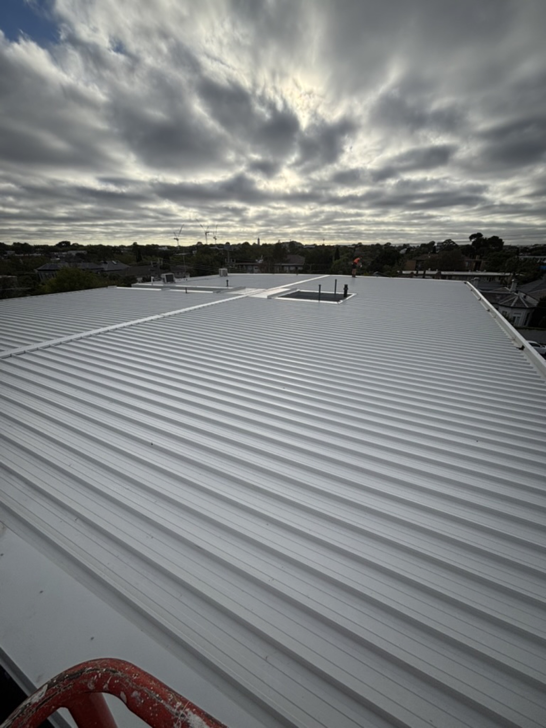 Heasly & Son commercial re-roof — Armadale Melbourne