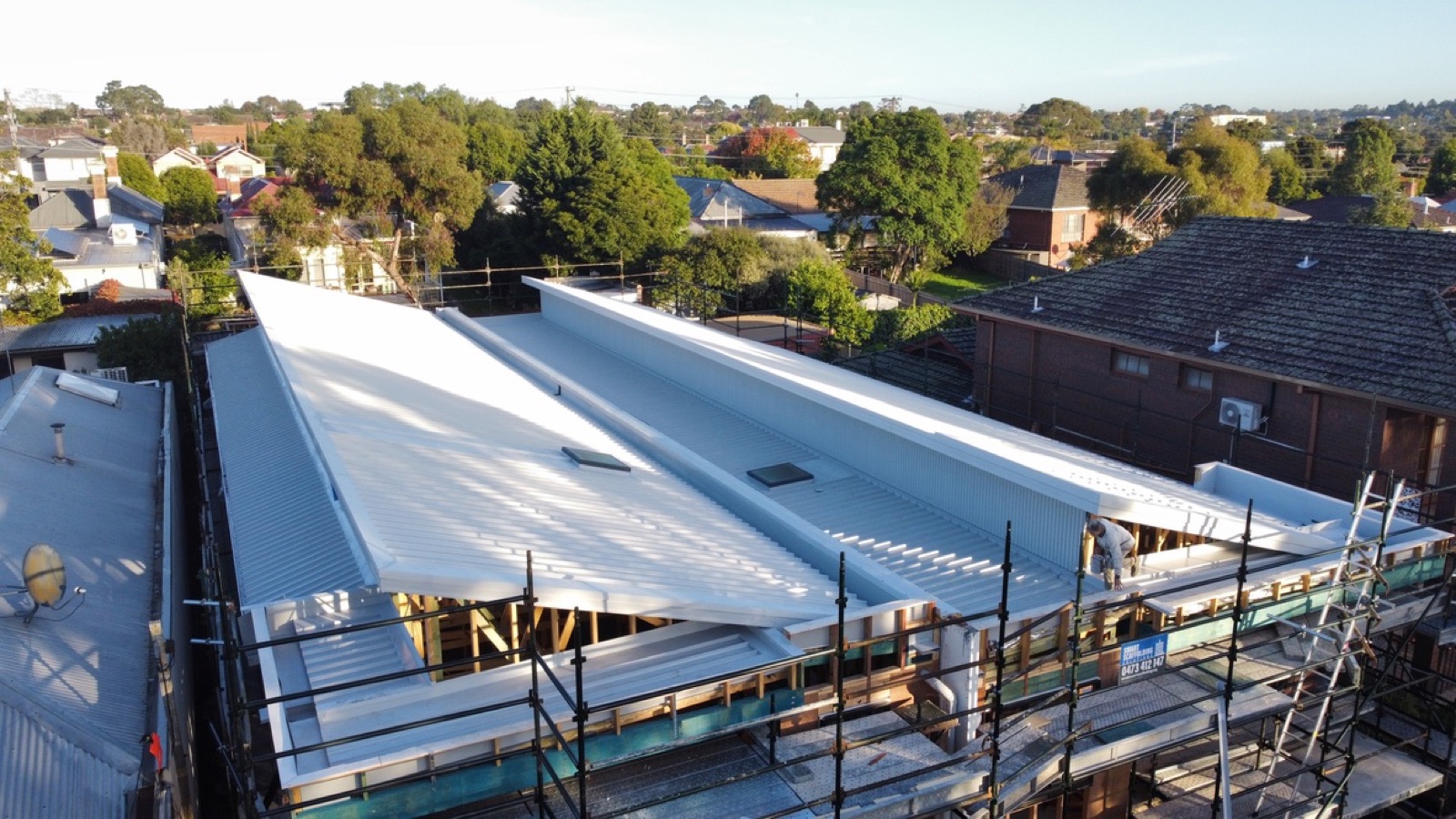 Essendon duplex — crew on site — Heasly & Son new home roofing Essendon Melbourne