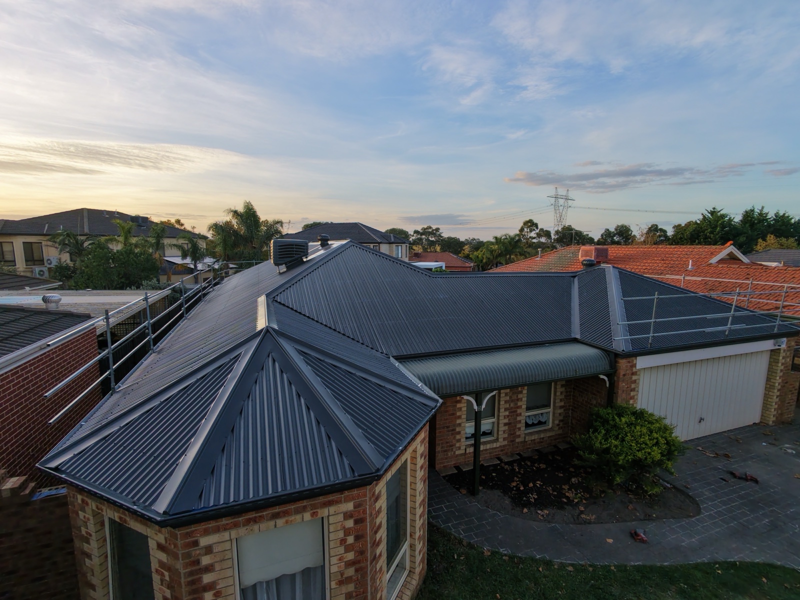 Taylors Lakes — tile to tin in Colorbond® Monument — Heasly & Son roof replacement Taylors Lakes Melbourne